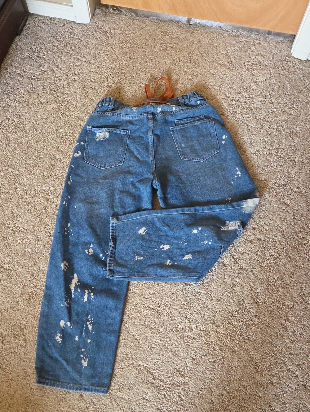 Distressed Blue Denim Paint-Splatter Barrel Leg Jeans with Brown Tie